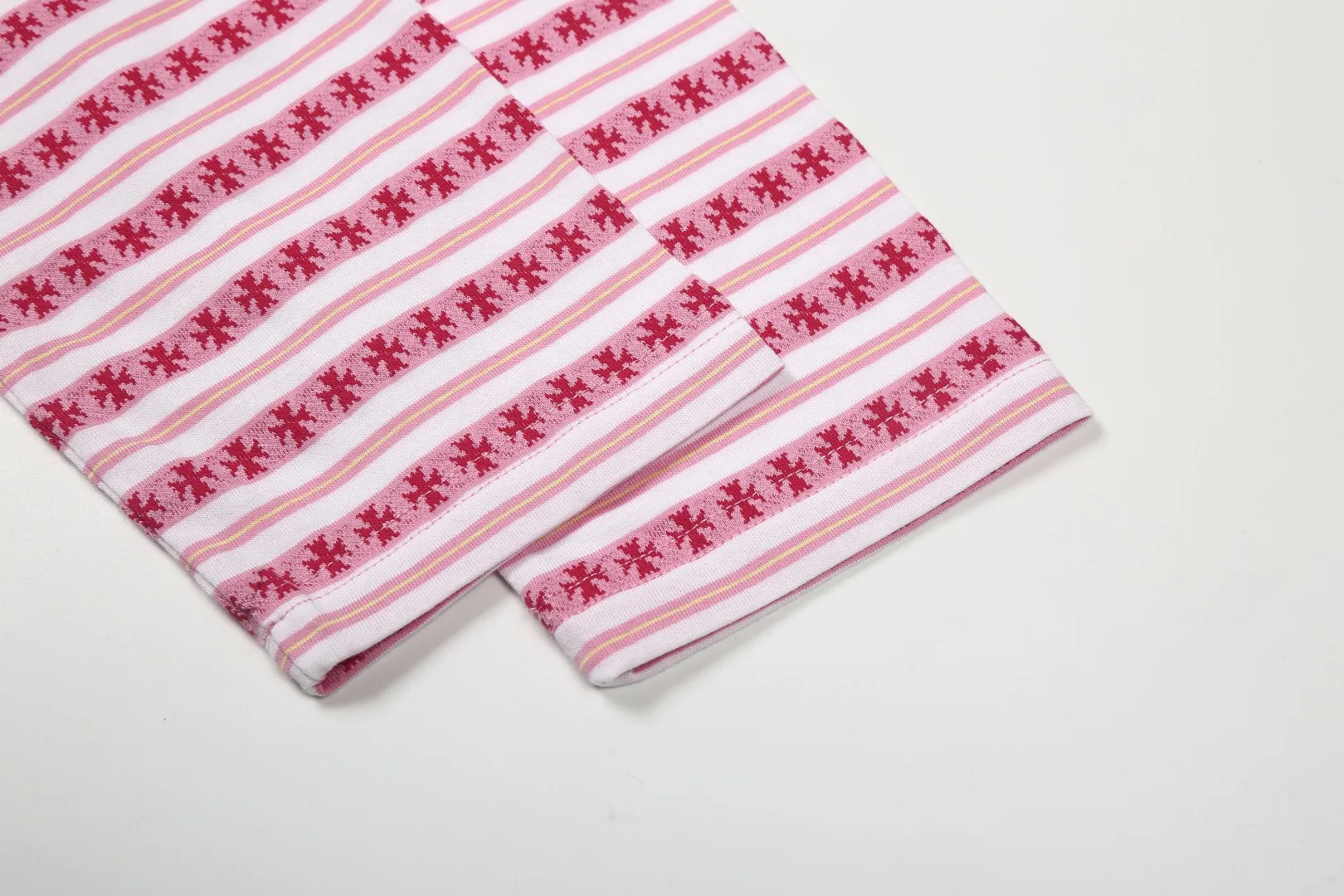 P210 White background picture [Popular item] Code: 25020# Color: Black/Pink/Blue Size: S to - CH Croix heart niche design cross jacquard striped long sleeves brings striped Polo to Next Levels. Loose fit. Same style for men and women. Lazy and casual. Street style. Three colors. Customized style.